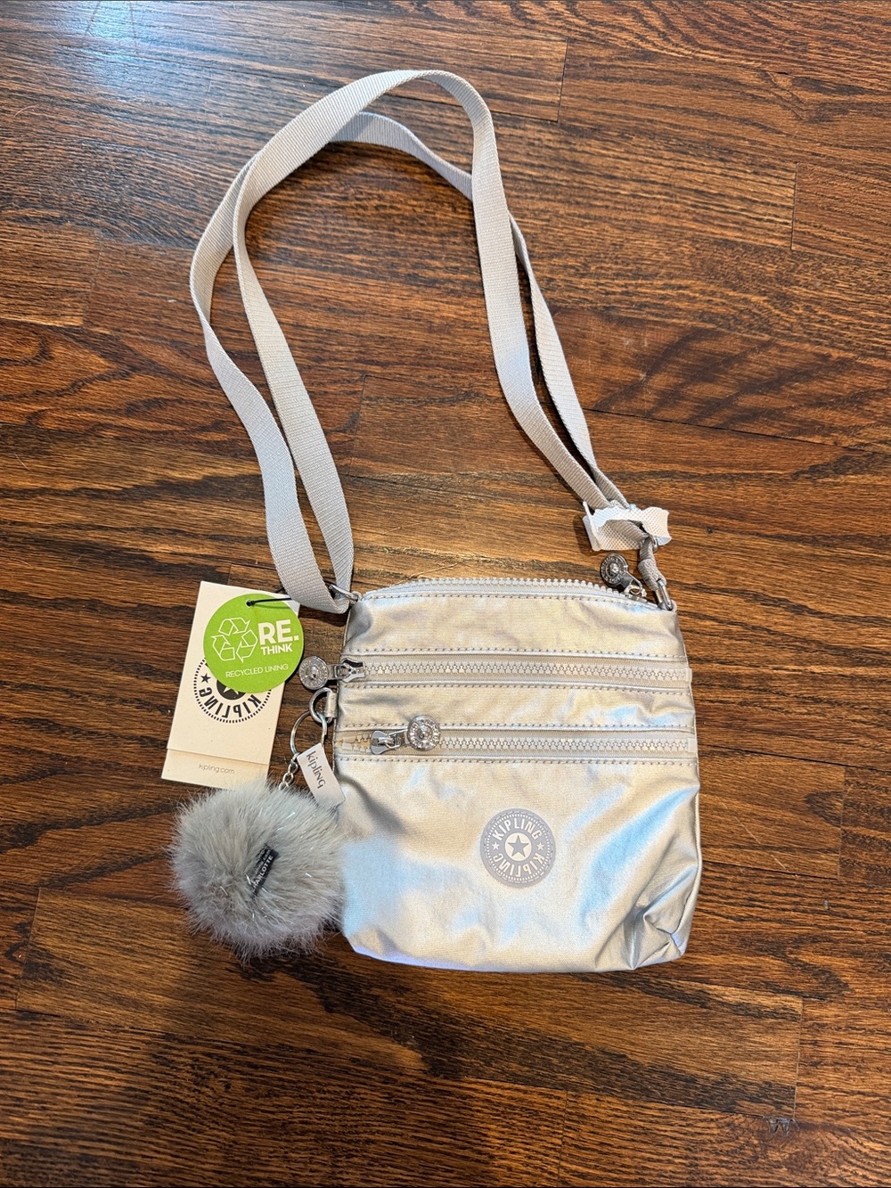 Kipling Silver Crossbody Bag with Furry Pom Accent